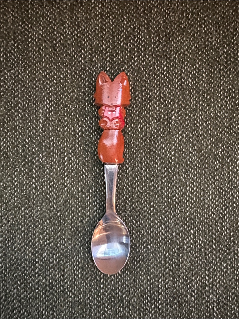 Hand-carved and painted wooden figural utensil fox